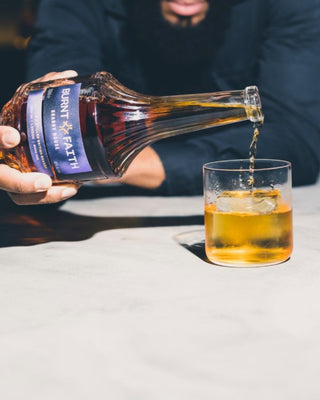 BrandywithBarmanpouringintoglassportraitproductimage